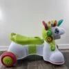 B. Toys Smilin’ Shimmer, 3-in-1 Sit, Walk And Ride Unicorn